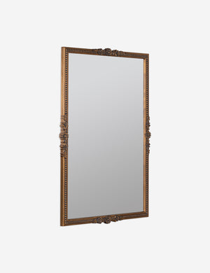 angled view of the Cantara gold rectangular floral detailed framed decorative wall mirror