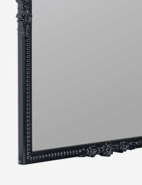 #color::black | close up detail view of the bottom corner of the Cantara black rectangular floral detailed framed decorative wall mirror