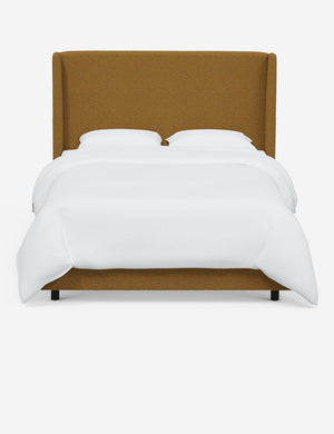 Adara ochre boucle upholstered bed.
