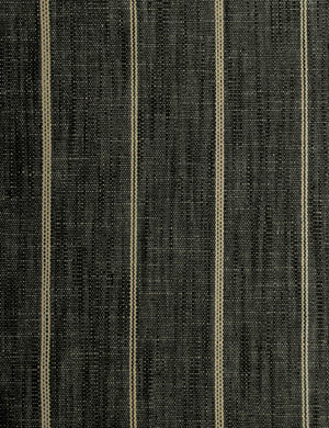 Close-up of the peppercorn stripe linen fabric on the Clementine platform bed