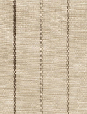 Detailed shot of the linen and stripe pattern on the Adara natural stripe linen upholstered bed.