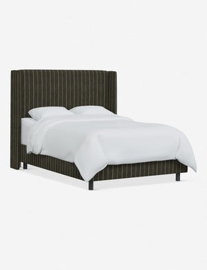 Angled view of Adara peppercorn stripe linen upholstered bed.