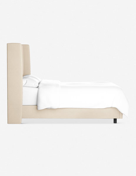 #color::natural-linen #size::twin #size::queen #size::cal-king #size::king #size::full | Side view of the Adara natural linen upholstered bed.