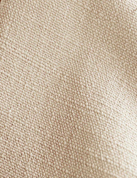 #color::natural-linen #size::twin #size::queen #size::cal-king #size::king #size::full | Detailed shot of the natural linen on the Adara natural linen upholstered bed.