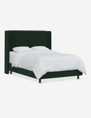 Angled view of Adara emerald velvet upholstered bed.