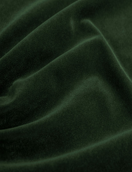 #color::emerald-velvet #size::queen #size::king #size::cal-king #size::twin #size::full | Detailed shot of the emerald velvet on the Adara emerald velvet upholstered bed. 