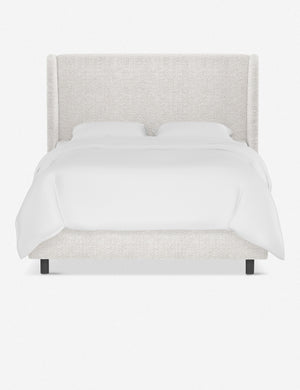 Adara white boucle upholstered bed.
