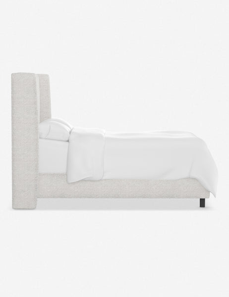 #color::white-boucle #size::twin #size::full #size::queen #size::king #size::cal-king | Side view of the Adara white boucle upholstered bed.