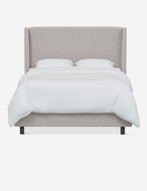 Adara ivory velvet upholstered bed.