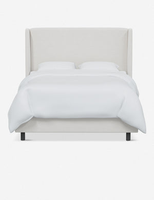 Adara white velvet upholstered bed.