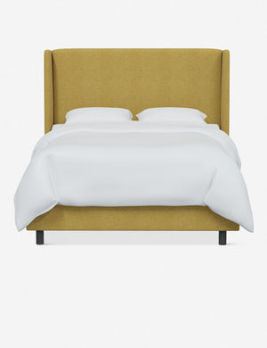 Adara yellow linen upholstered bed.