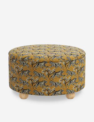 Angled view of the Kamila tiger golden 34 inch ottoman
