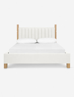 Ambleside Oyster White Linen upholstered bed with a wood-post bed frame and a headboard with vertical channeling by Ginny Macdonald