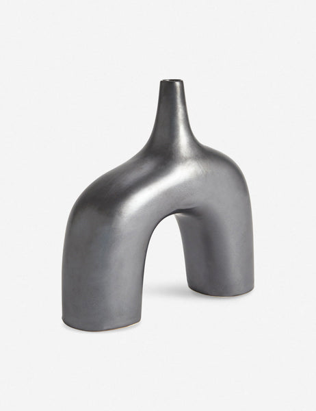 #color::black #size::large | Angled view of the Leonor sculptural arched shiny black ceramic Vase in its larger size
