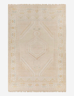 Lotus hand-knotted natural-toned rug with a floral border and geometric detailing in a traditional medallion design