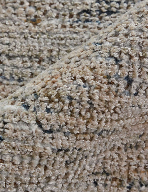 Detailed view of the natural fiber fabric on the Ismenia distressed persian rug