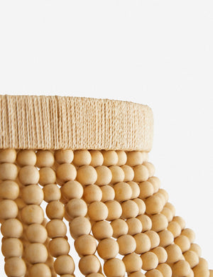 Close-up of the wooden beads and abaca rope on the top of the Tulane open-woven wooden chandelier by Arteriors