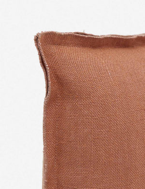 Corner of the arlo rust orange lumbar pillow