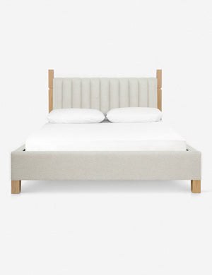 Ambleside Taupe Boucle upholstered bed with a wood-post bed frame and a headboard with vertical channeling by Ginny Macdonald