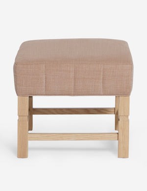 Ambleside Apricot linen upholstered ottoman by Ginny Macdonald with a carved frame and vertical channeling on the cushion