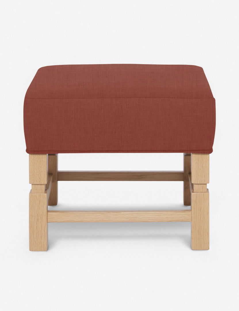 #color::terracotta-linen | Ambleside Terracotta linen upholstered ottoman by Ginny Macdonald with a carved frame and vertical channeling on the cushion