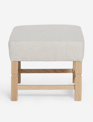 Ambleside Taupe Boucle upholstered ottoman by Ginny Macdonald with a carved frame and vertical channeling on the cushion