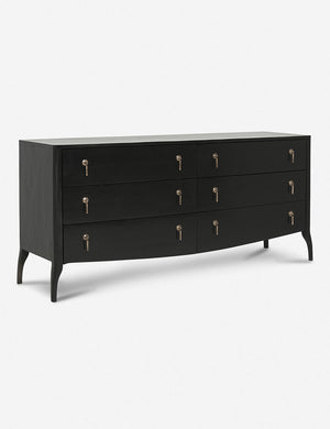 Angled view of the Anabella black wood dresser with silver drawer pulls
