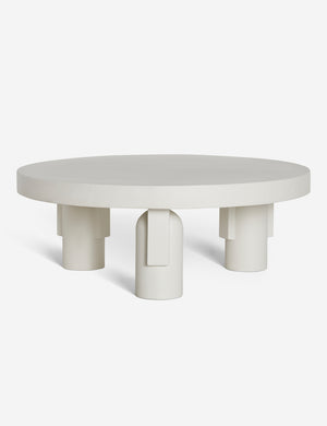 Anja white indoor and outdoor round coffee table with sculptural legs