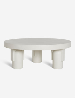 Anja white indoor and outdoor round coffee table with sculptural legs