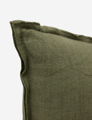Corner of the arlo Olive green square pillow