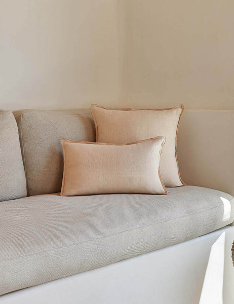 #color::blush #style::square | The arlo Blush pink flax linen pillow in its lumber and square sizes sit together on a natural linen sofa