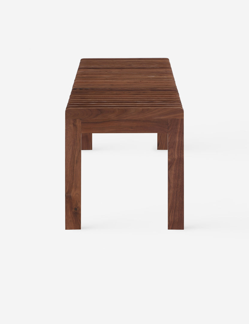 #color::walnut | Side view of the Olson mid-century slatted wood bench in walnut.