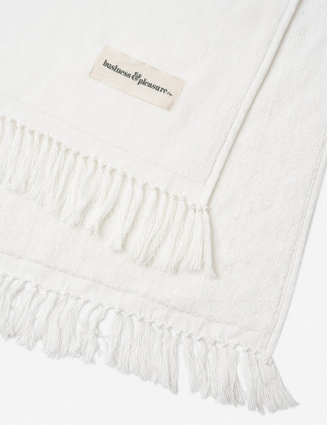 #color::antique-white | Close-up of the fringed ends on the Antique white Beach Towel by Business & Pleasure Co