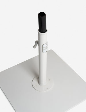 Angled view of the  pole-insert inside the neck of the Classic white umbrella base by business and pleasure co