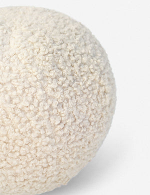 Angled view of the Ivory Bouclé Ball Pillow by Sarah Sherman Samuel