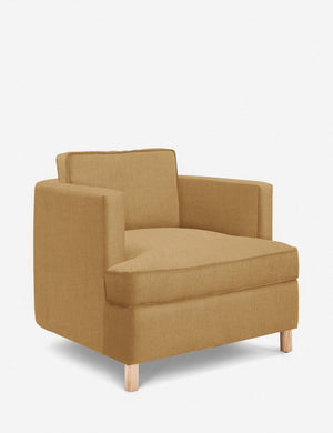 Angled view of the Belmont Camel yellow linen accent chair