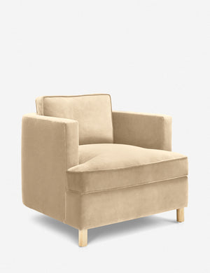 Angled view of the Belmont Brie beige velvet accent chair