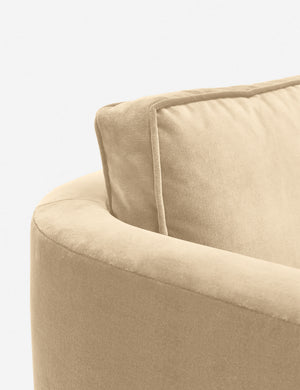 Close-up of the curved back on the Belmont Brie beige velvet accent chair