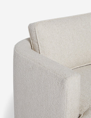 Close-up of the curved back on the Belmont Taupe boucle accent chair