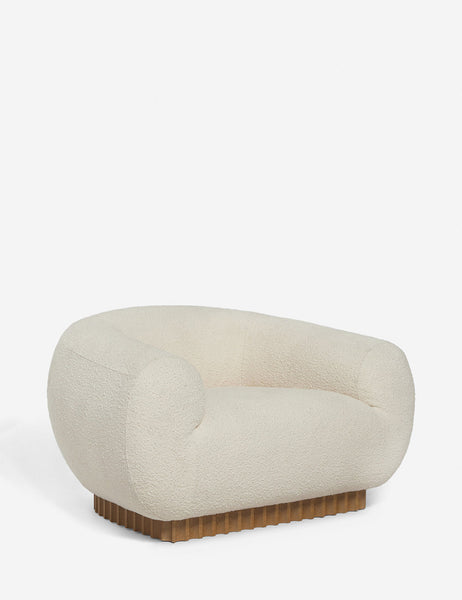| Angled view of the Billow ivory boucle lounge chair 