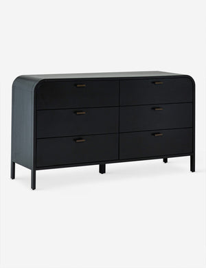 Angled view of the brooke black oak 6-drawer rounded dresser