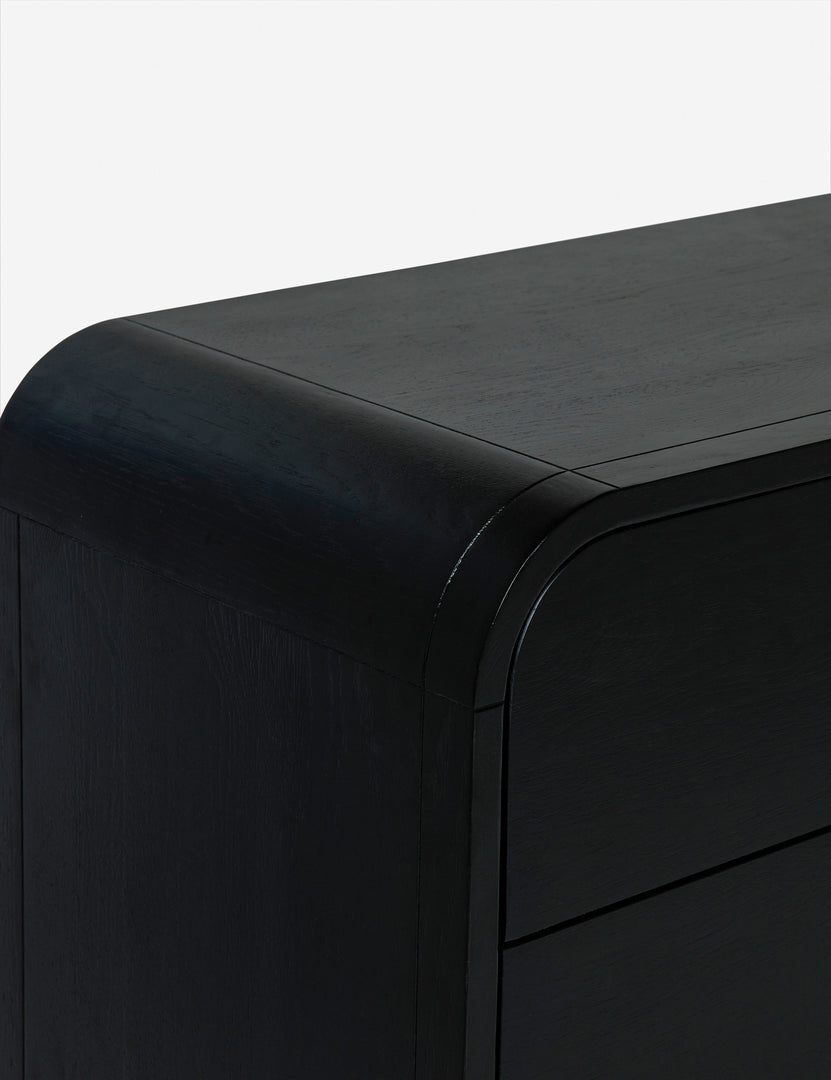 #color::black | Rounded corner of the brooke black oak 6-drawer rounded dresser