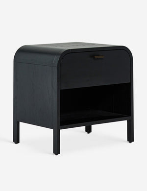 Angled view of the Brooke one drawer black nightstand