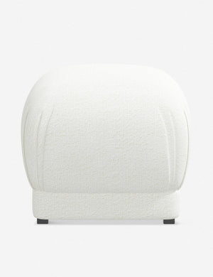 Bailee White Boucle upholstered ottoman with a pouf-like design and pleated corners