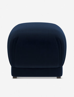 Bailee Navy Velvet upholstered ottoman with a pouf-like design and pleated corners