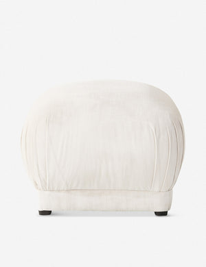 Bailee Snow Velvet upholstered ottoman with a pouf-like design and pleated corners