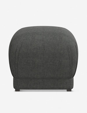 Bailee Charcoal Linen upholstered ottoman with a pouf-like design and pleated corners