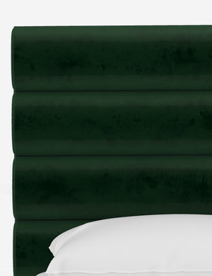The horizontal tufted headboard on the Bailee Emerald Velvet platform bed