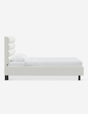 Side of the Bailee White Boucle platform bed