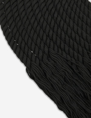 Close up of the woven construction of the black forte wall hanging